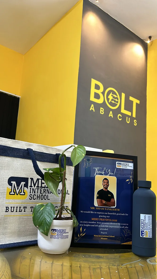 Bolt Abacus wall with a framed thank-you gift from Meru International School